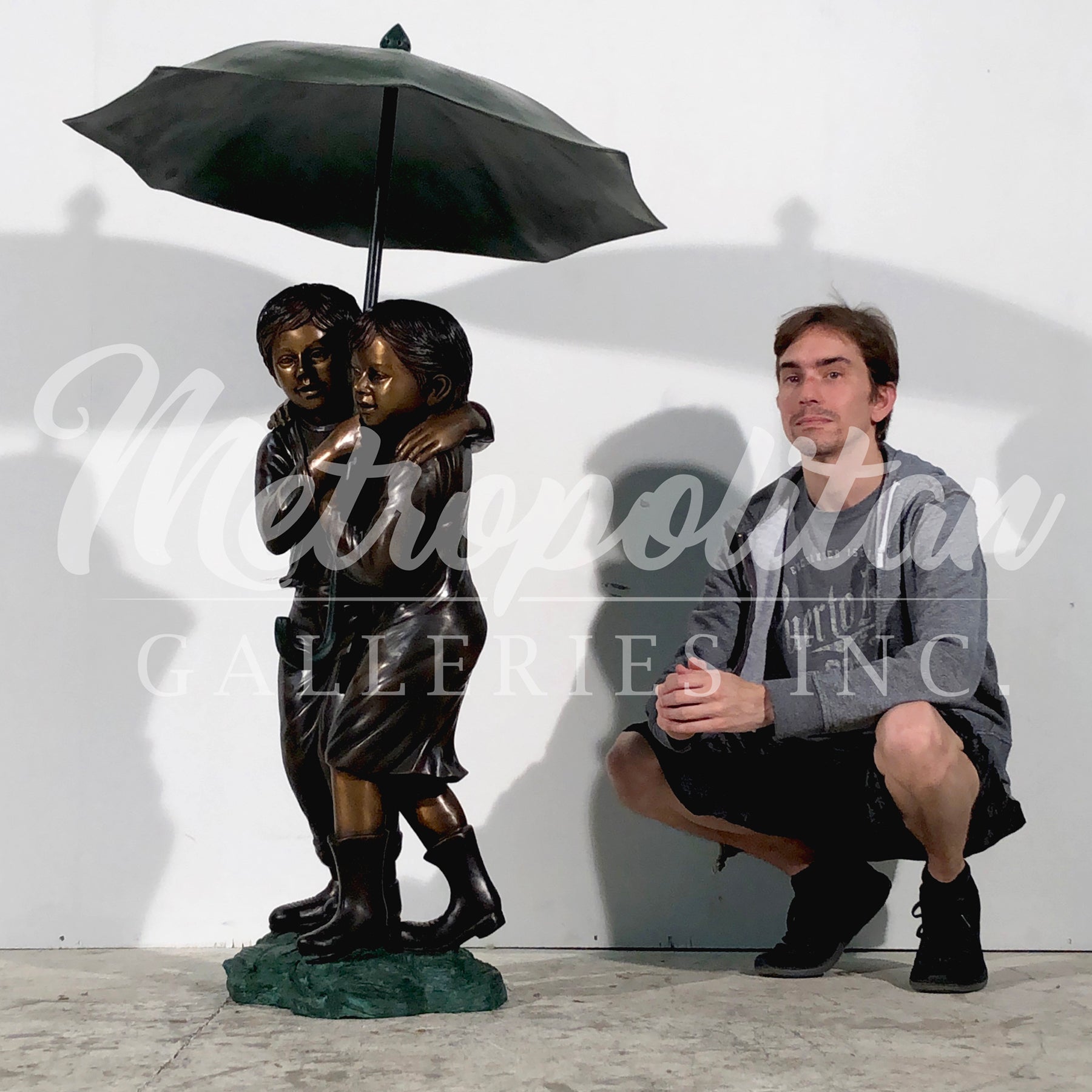 Children Under Umbrella Fountain Bronze Statue