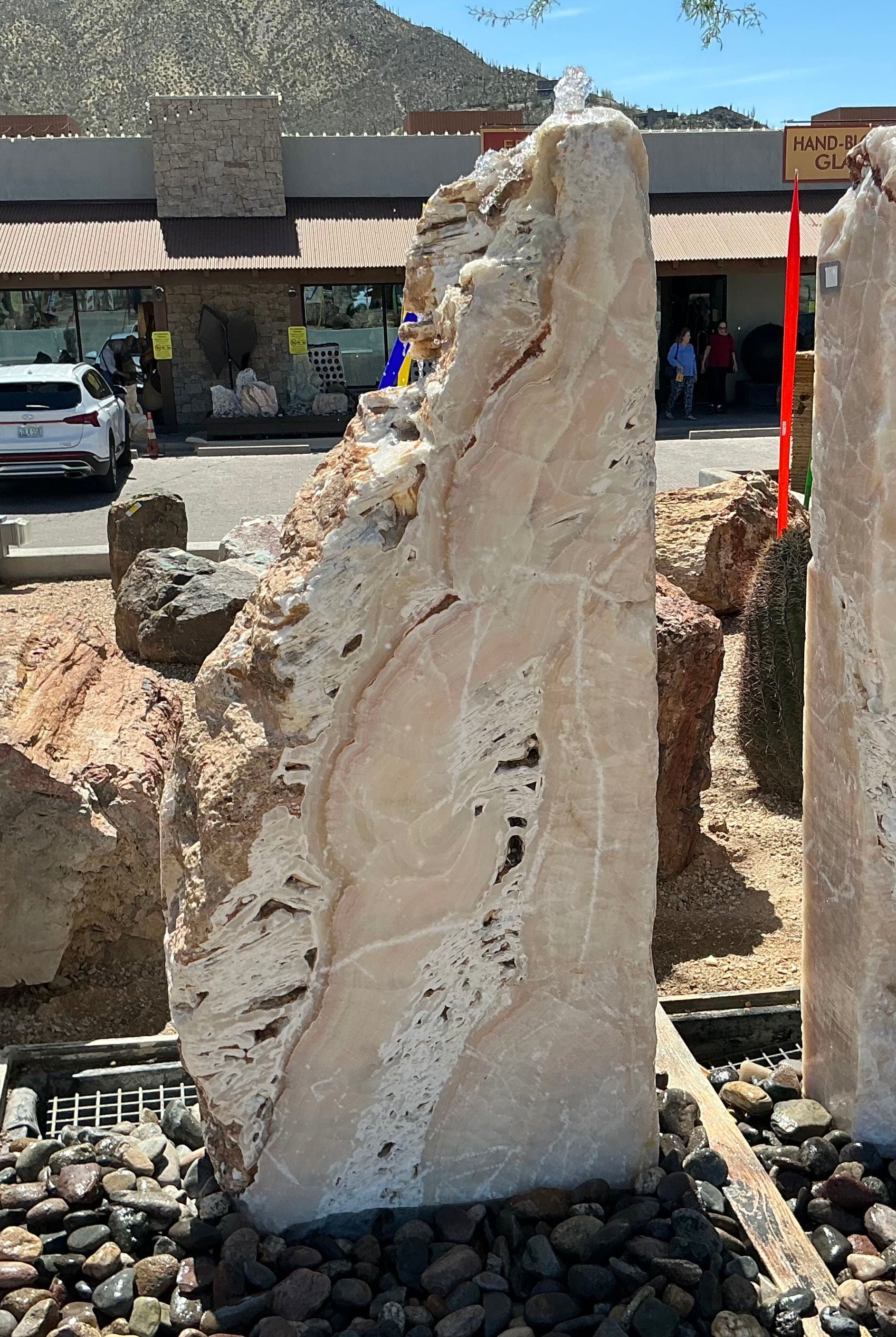 Meil Onyx Fountain with 3 Cut Sides and White Fossil Rustic Edge