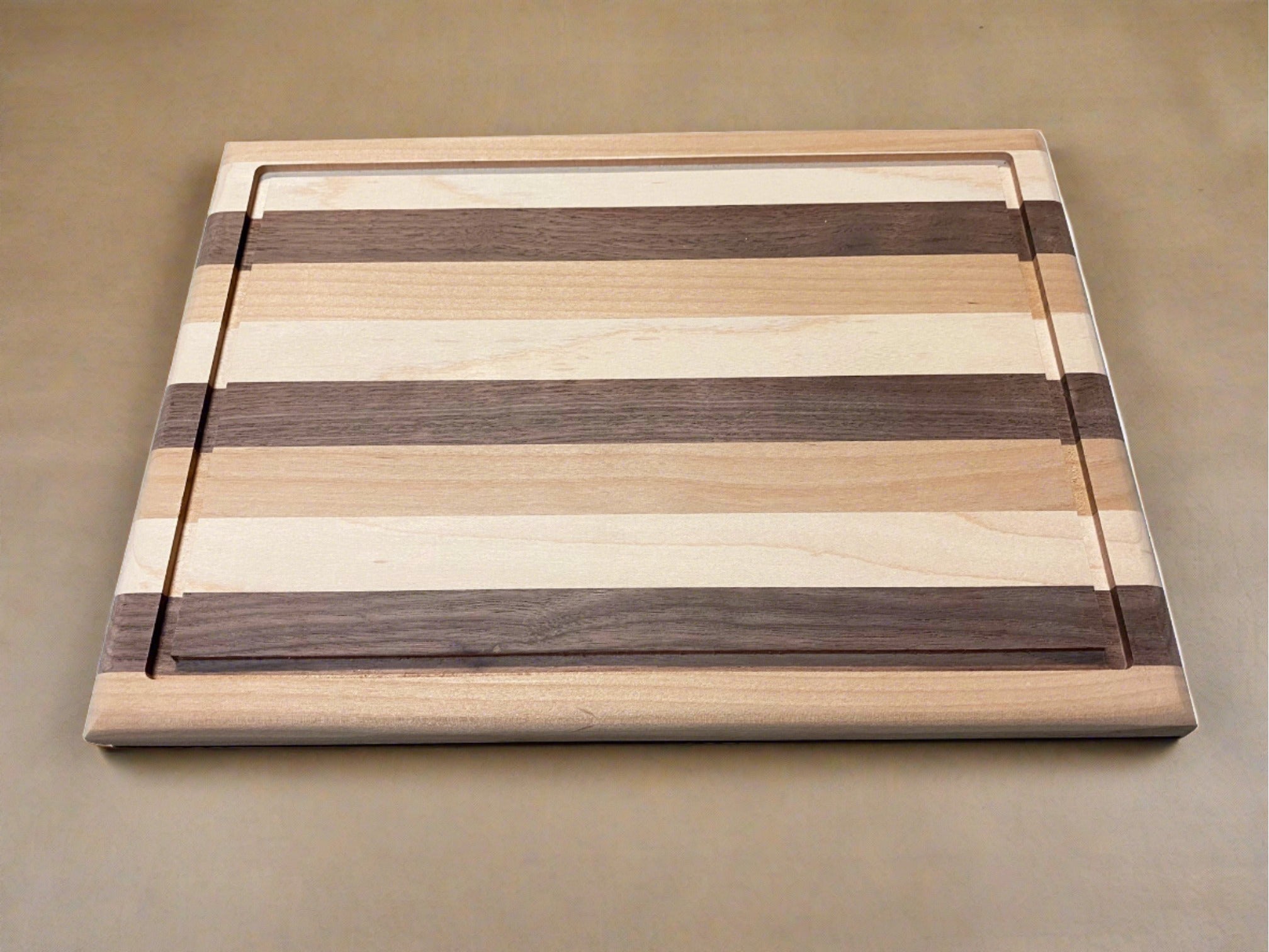 Modern Mix of Alder, Walnut and Maple Side grain Cutting Board